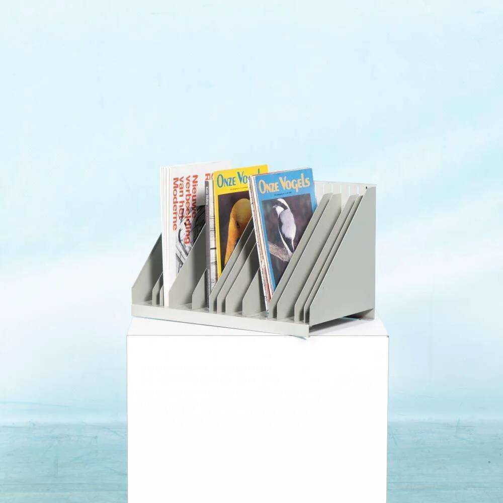 Vintage 1960s metal magazine rack, storage for single LPs.