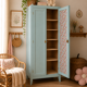 Vintage Parisian wardrobe in grey-blue green.