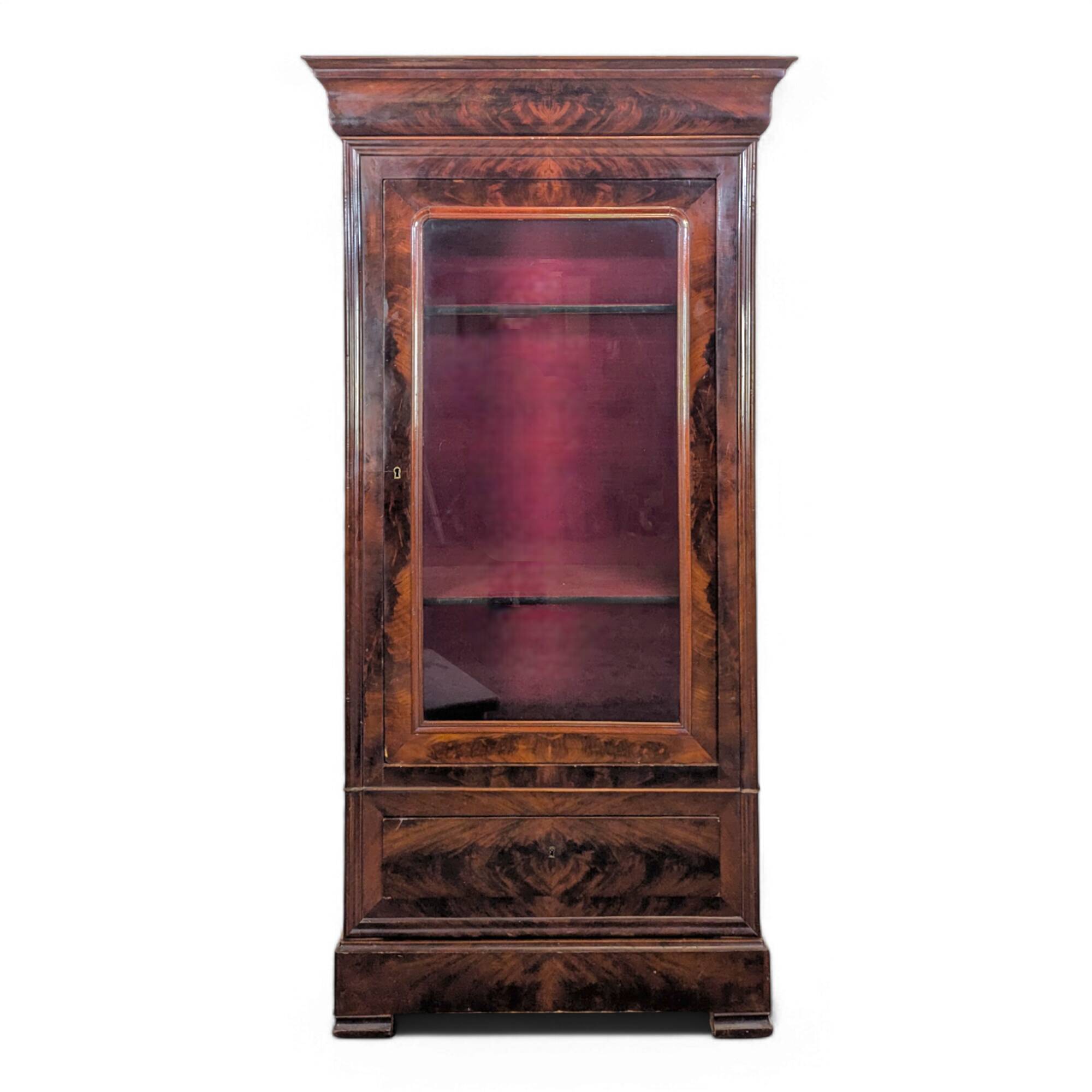 Louis Philippe period glass cabinet in flamed mahogany
