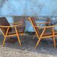 Pair of vintage armchairs with compass legs, "Boomerang" model by THO editions.