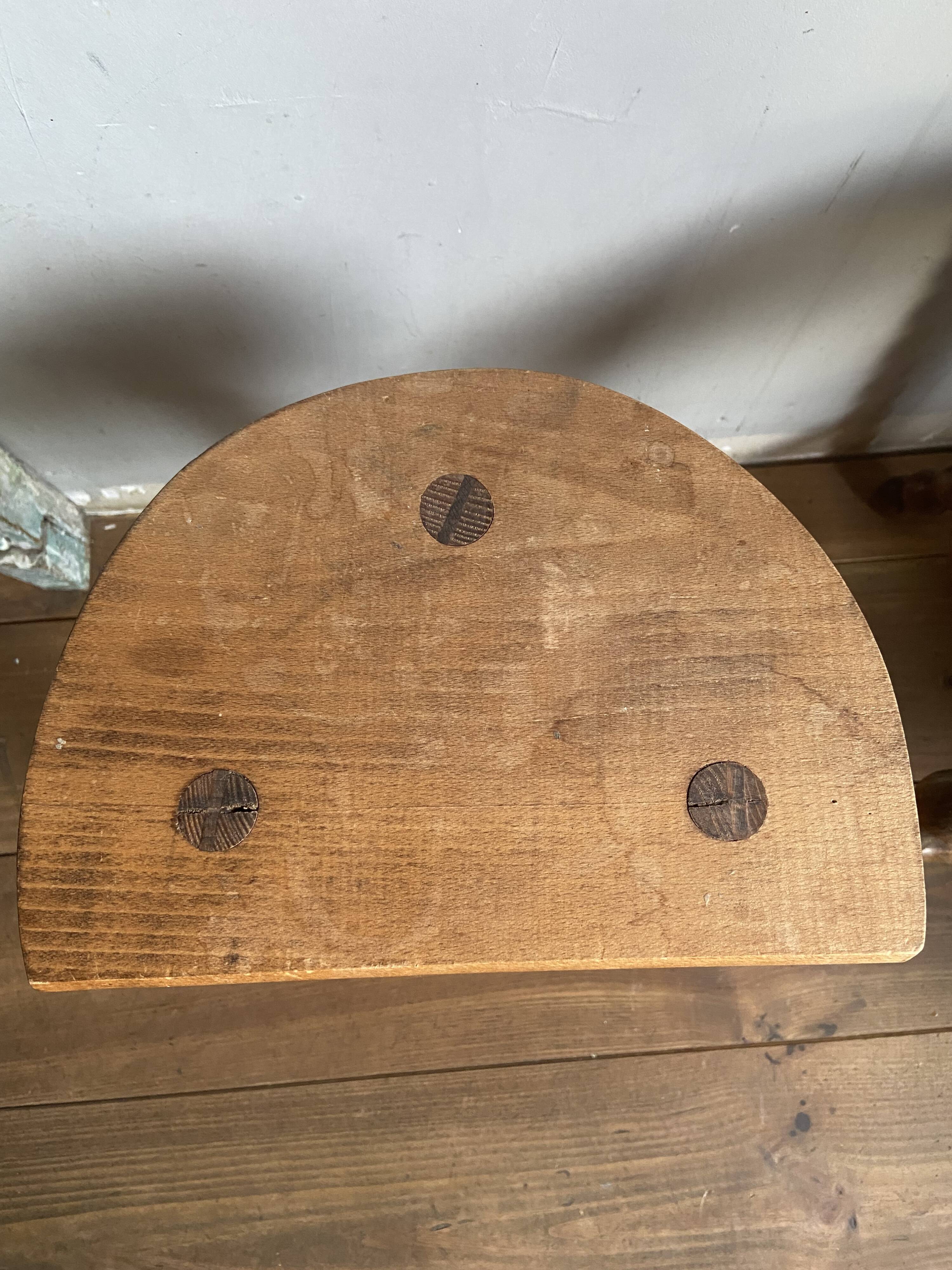 Pair of wooden milkman's stools turned brutalist
