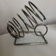 Spring bottle holder in silver metal 1970