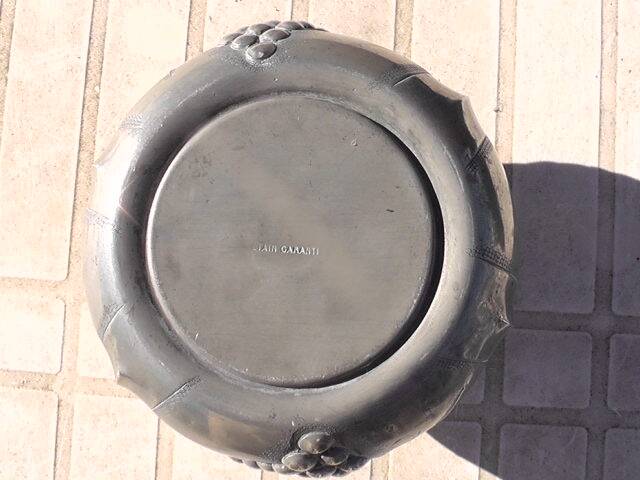 Pewter vase with vine decoration, 1930