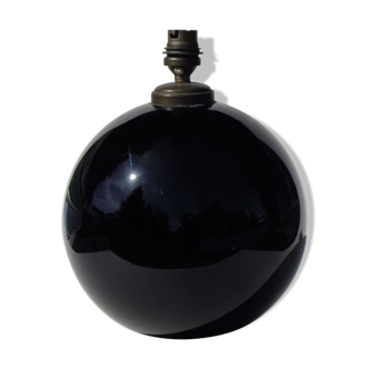 Old lamp foot shaped ball in black glass
