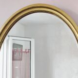 Antique gold oval mirror