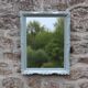 Vintage wall mirror in carved blue-green wood – rococo style – H48 cm