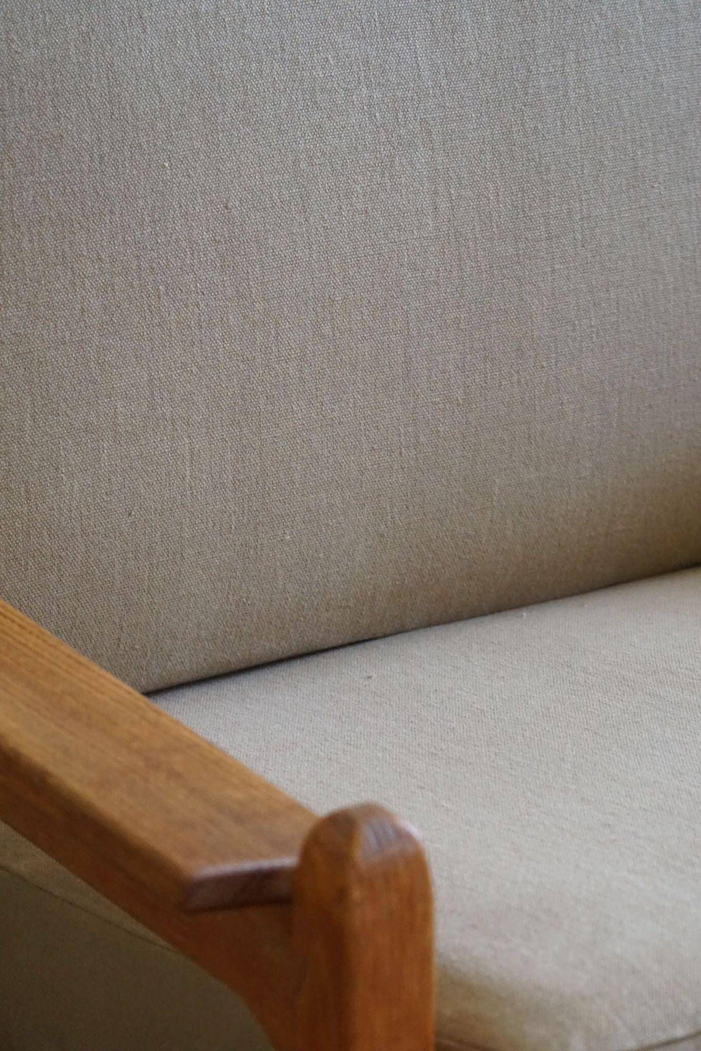 Modern Danish, Pair of Lounge Armchairs in Oak and Linen, Henning Kjærnulf, 1960s