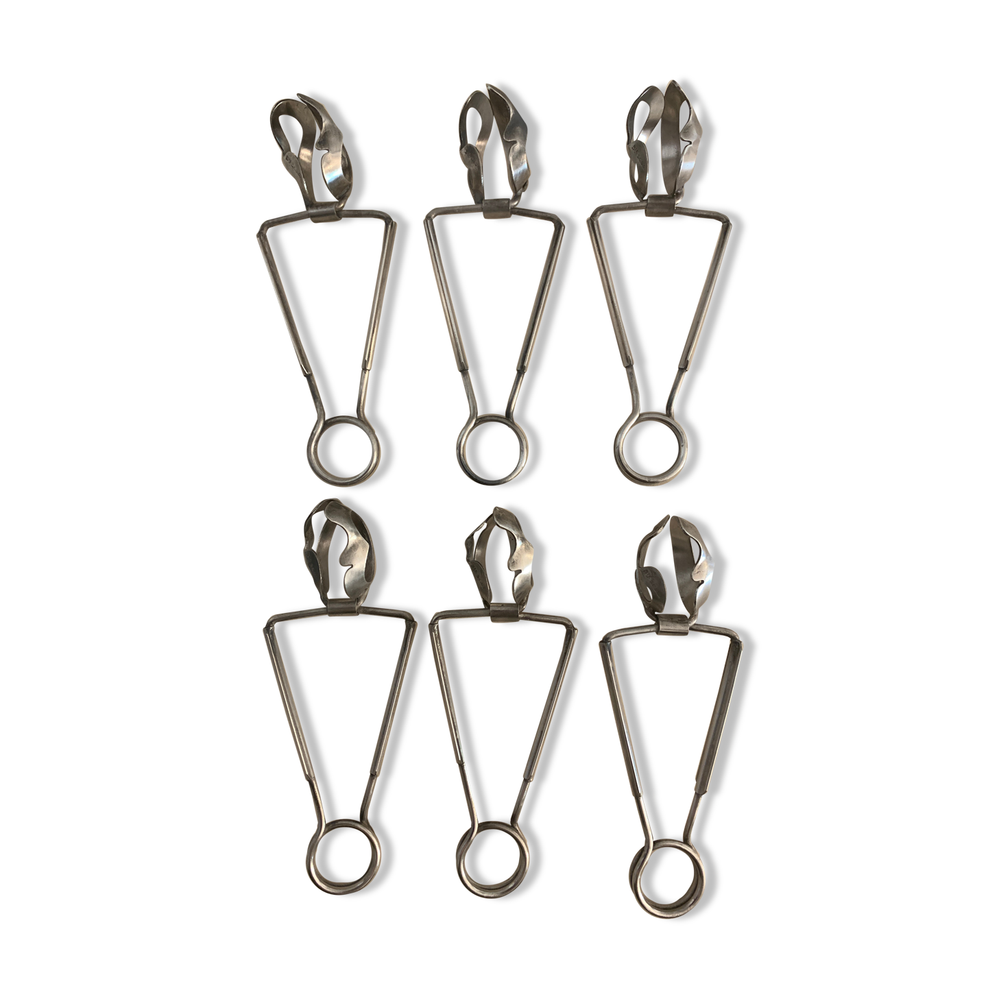 6 silver metal snail clips in their original box