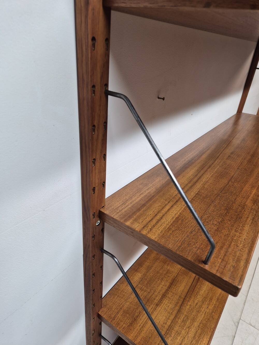 Teak shelving system, marked made in Denmark, 1960.