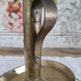Brass pusher candle holder on oval frame