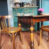 Antique farmhouse table and bistro chairs