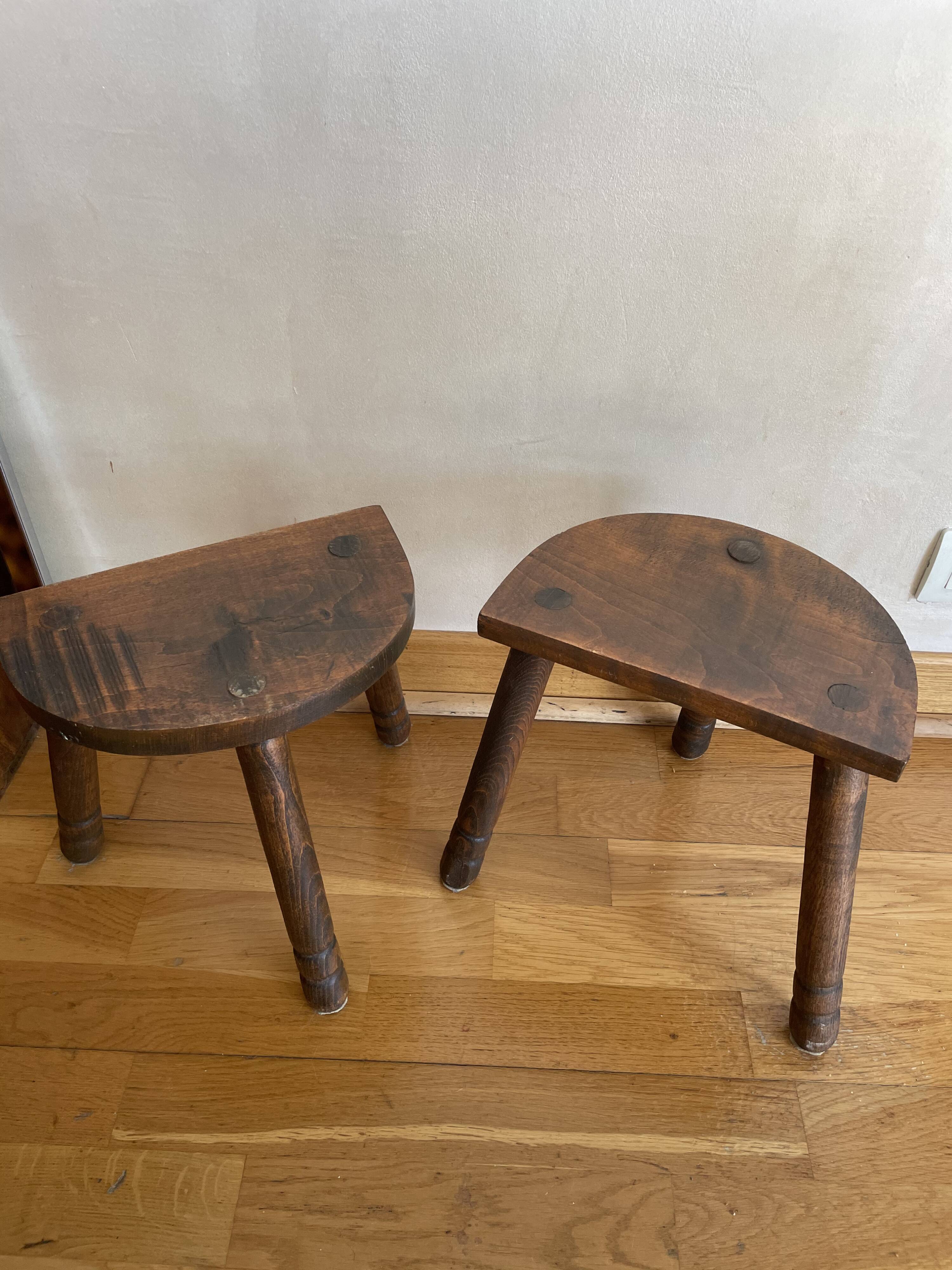 Duo of tripod oak stools