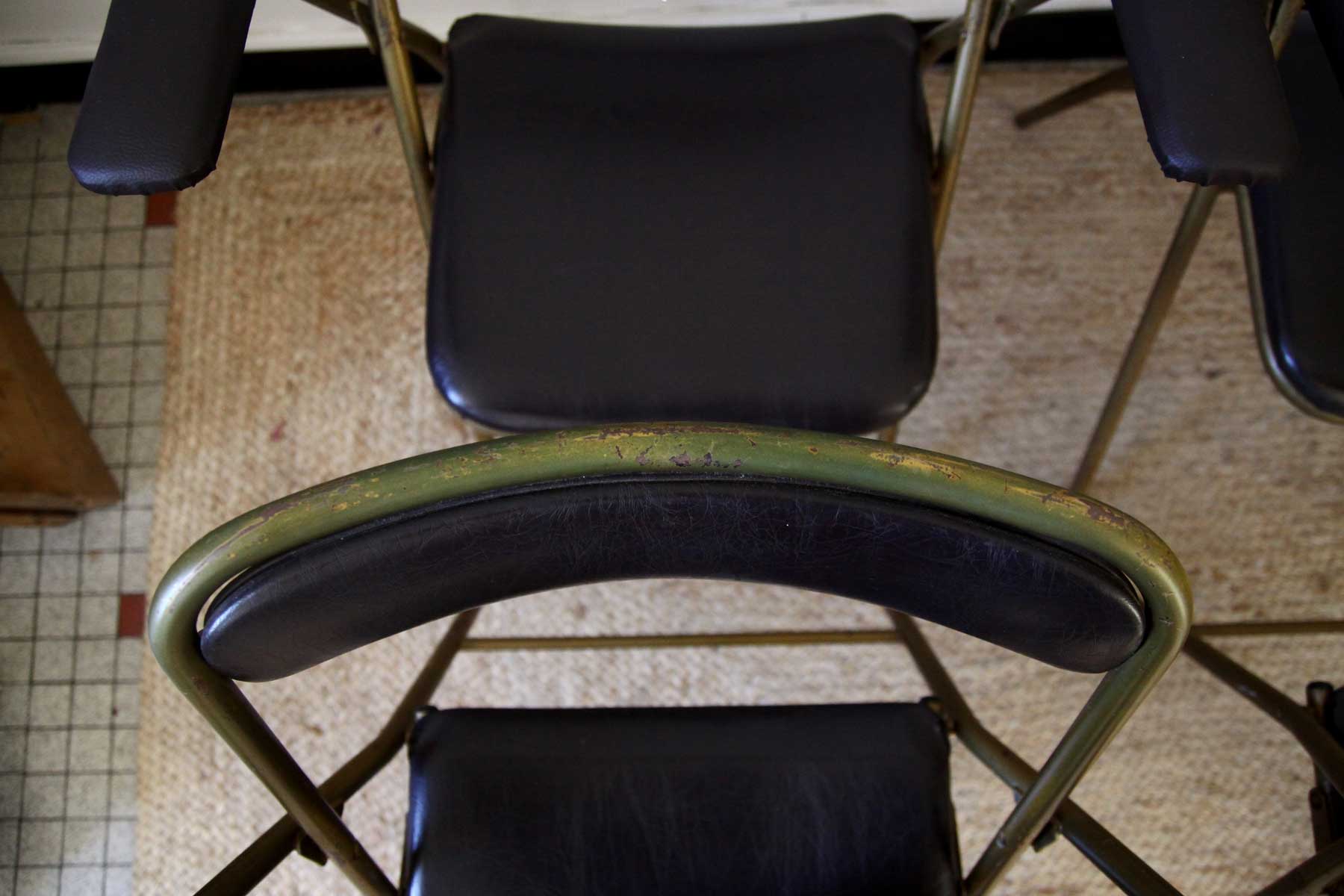 Lot of 4 metal and skai folding chairs