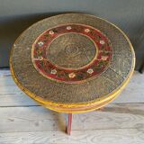 Pedestal table in polychrome wood and gold metal veneer