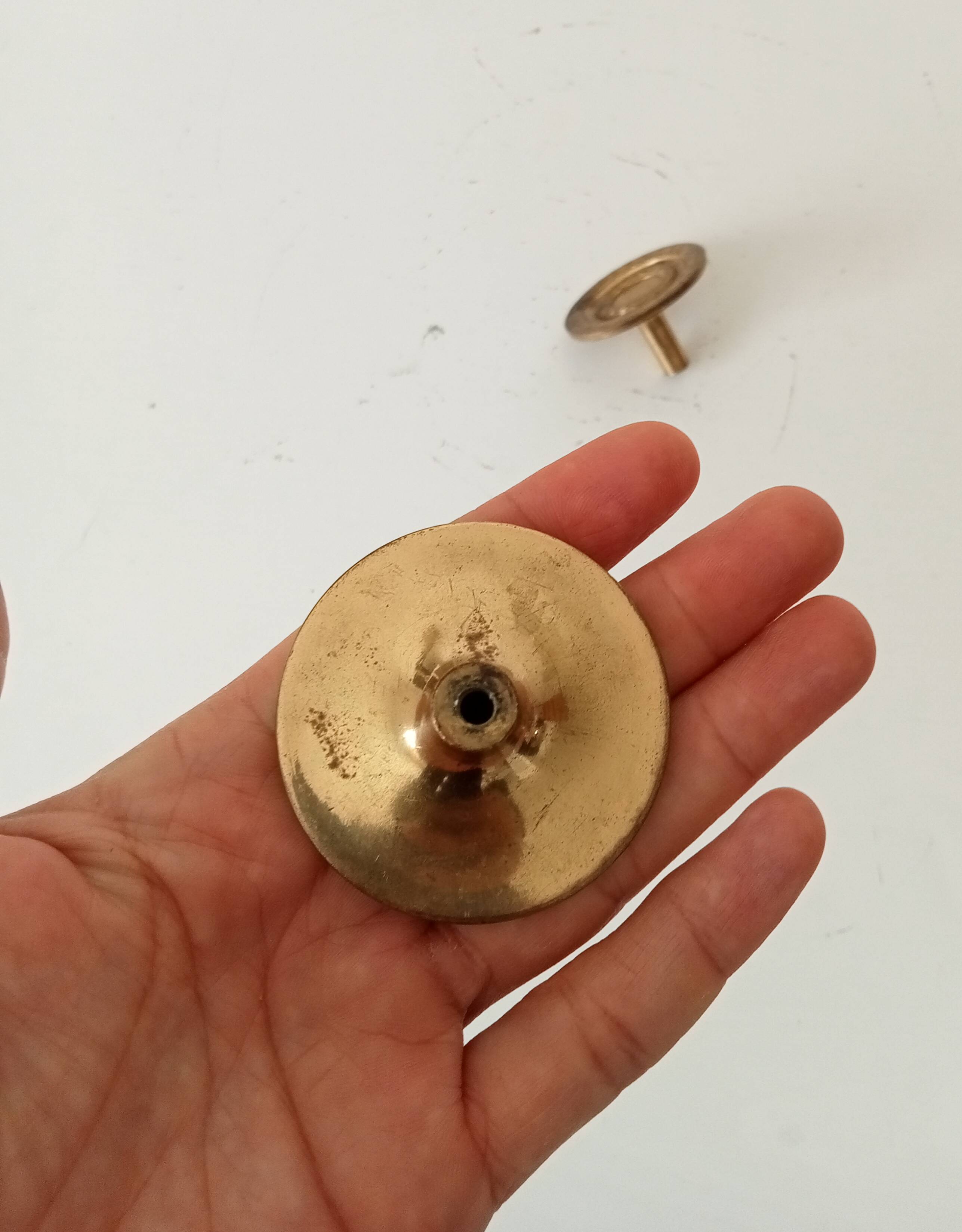 Pair of antique Empire furniture knobs in gilded solid bronze.