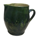 Green varnished earth pitcher with flower pattern