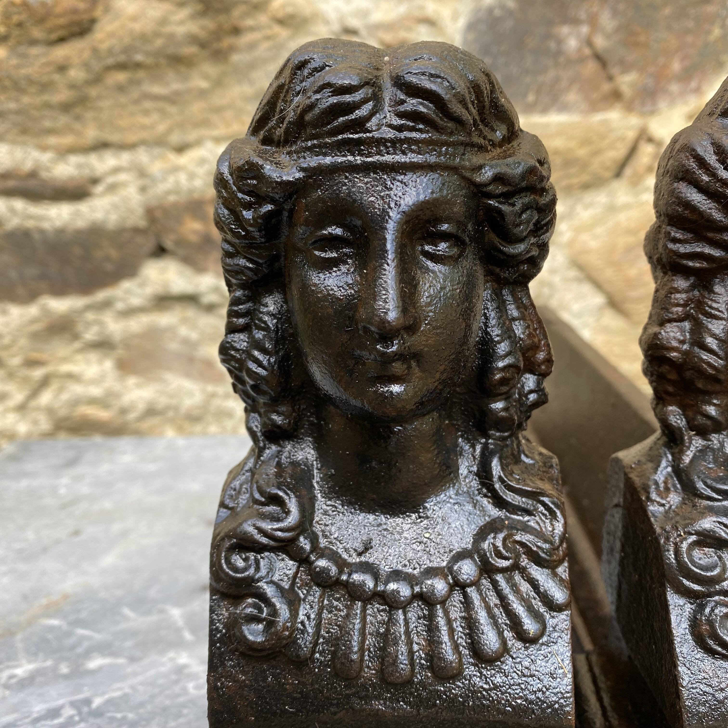 Pair of antique cast iron fire dogs "Ariadne"