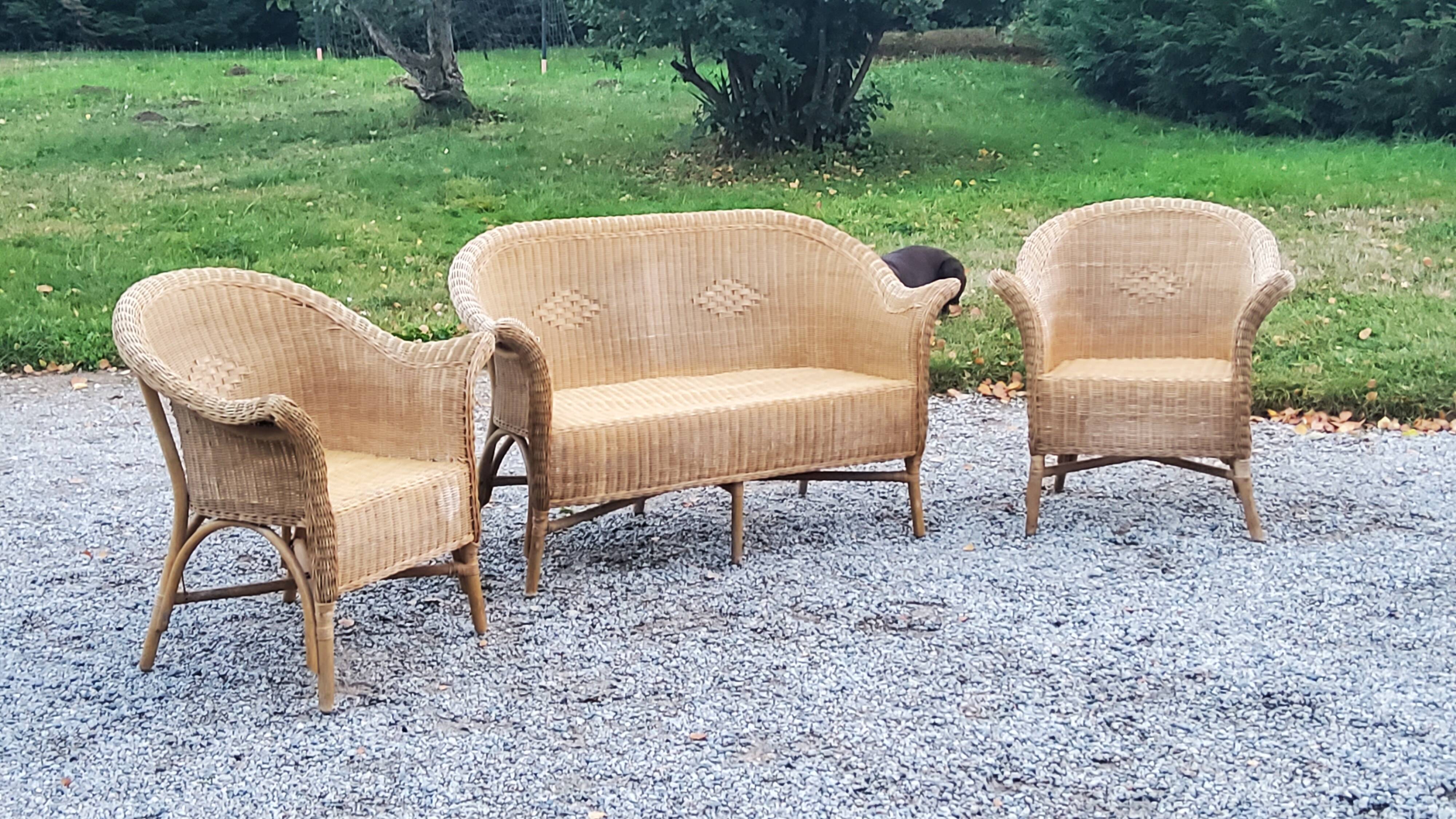 Pair of armchairs and bench in rattan and bamboo from the 60s/70s