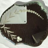 Bevelled mirror engraved under vase or bottle