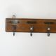 Old hanging wooden tea towels