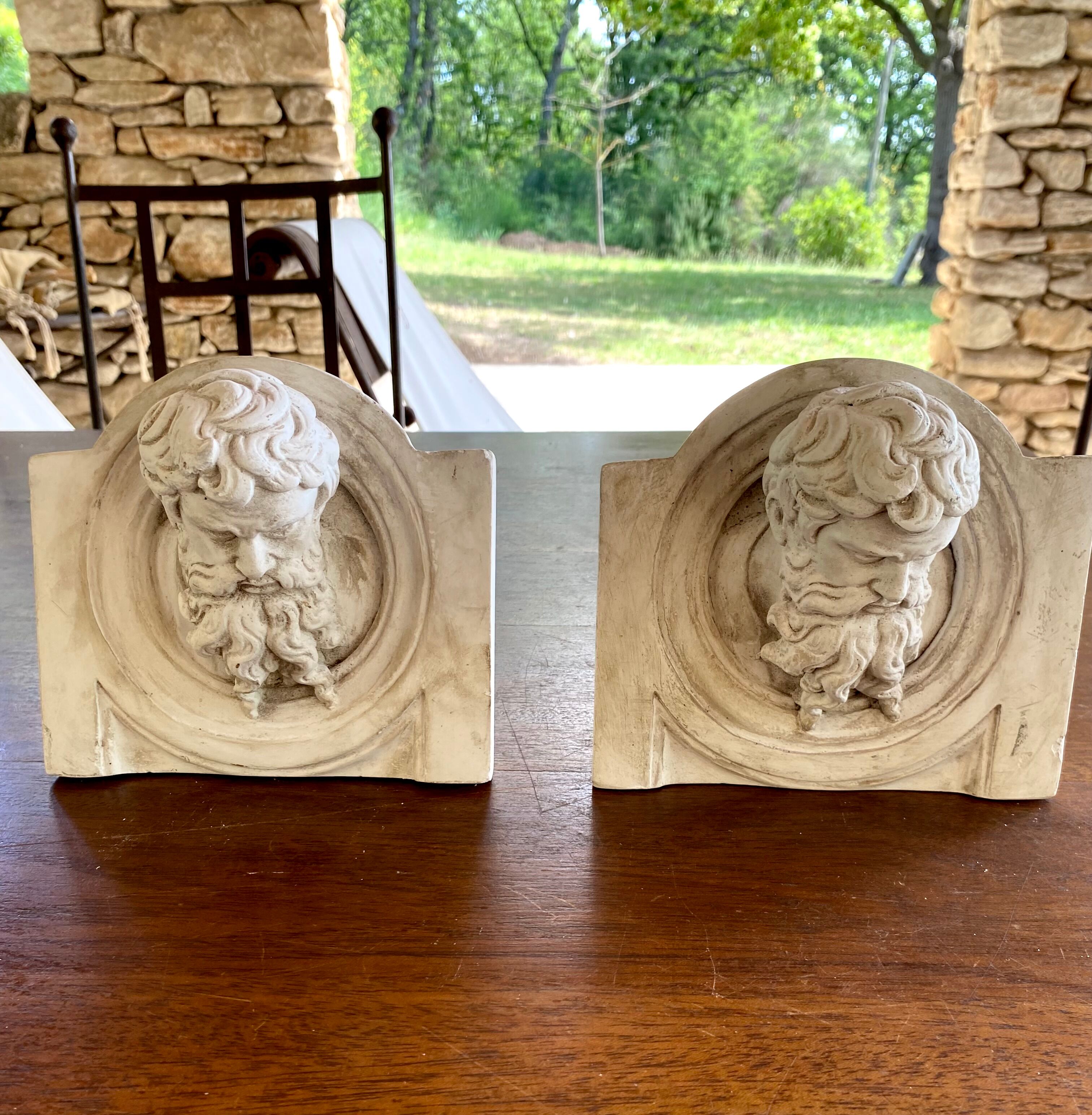Two moulds; plaster heads