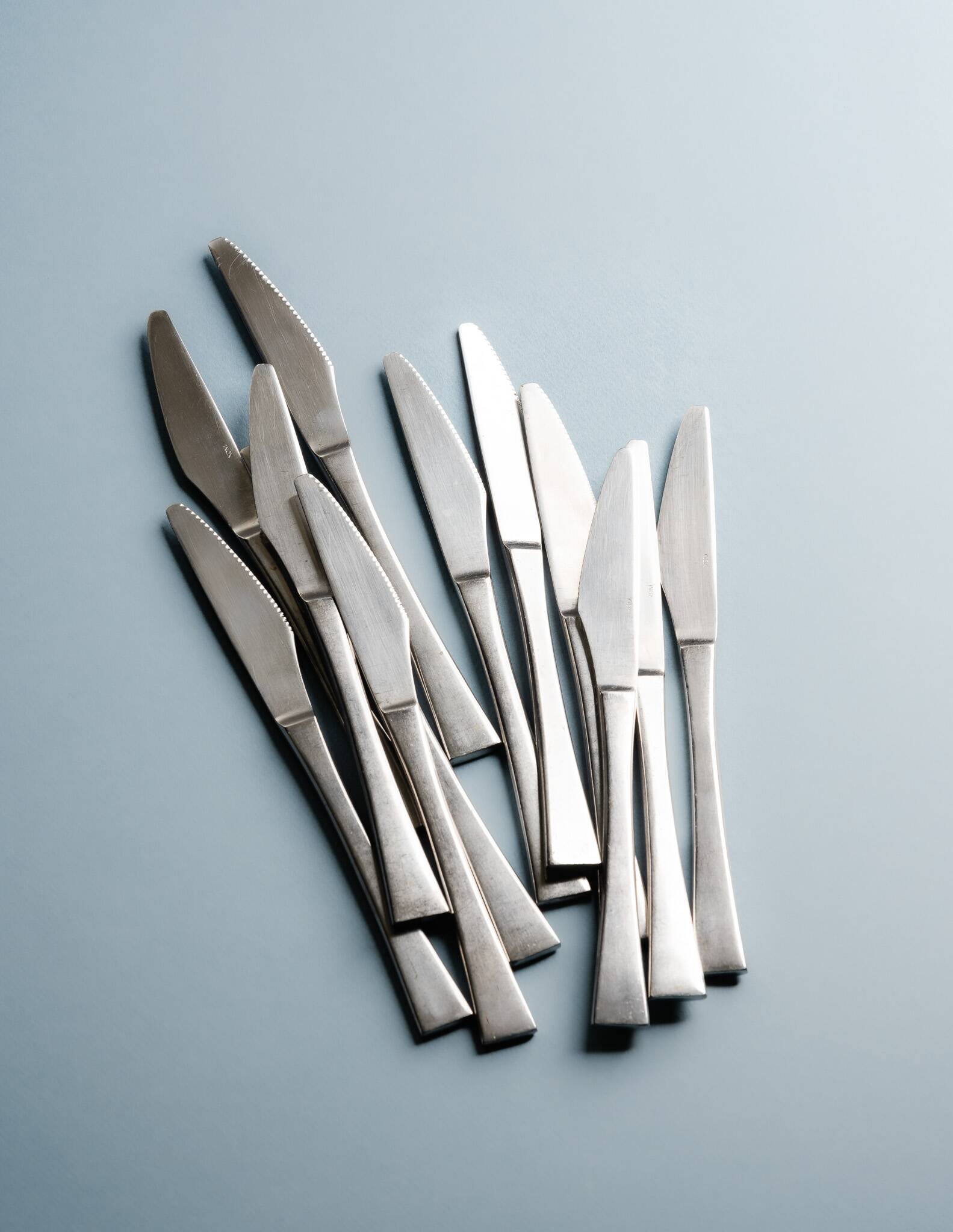 GUY DEGRENNE STAINLESS STEEL CUTLERY SET, 1970s