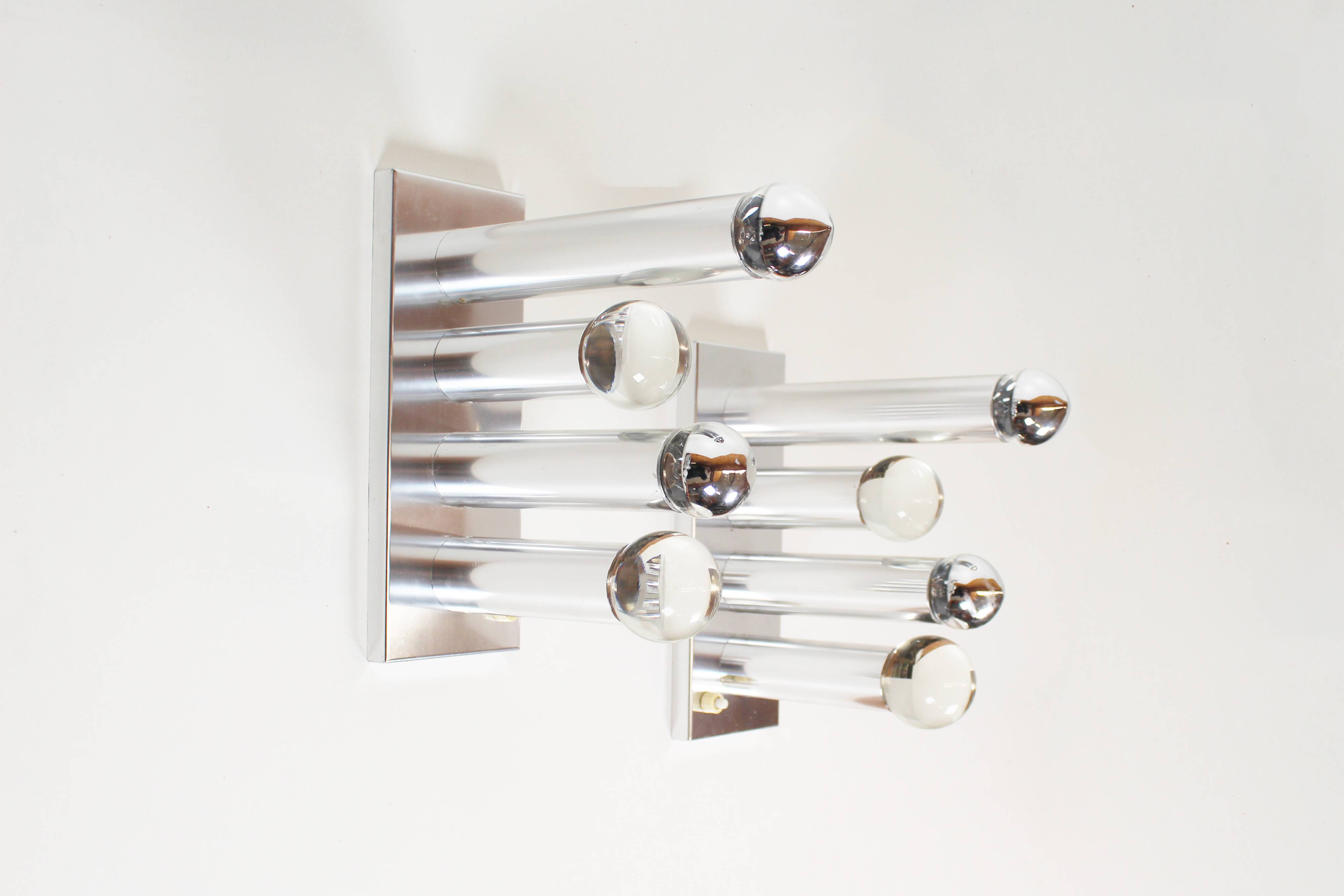 Pair of polished wall lamps by Gaetano Sciolari