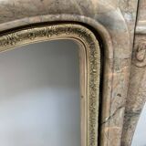 Cheminée de style Louis XV en marbre de breche rouge XIX siècle