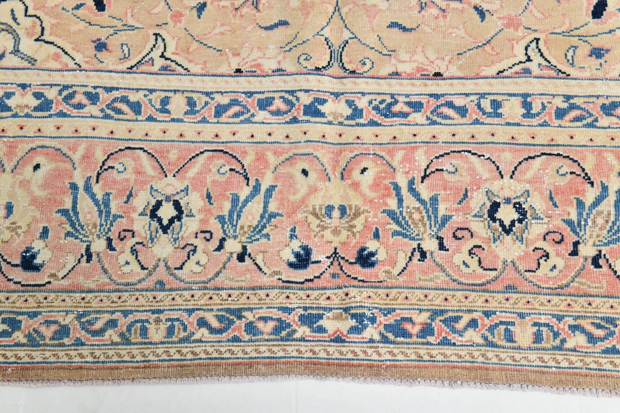 Antique Turkish wool rug in faded floral patterns, 10 x 13 feet.