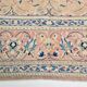 Antique Turkish wool rug in faded floral patterns, 10 x 13 feet.