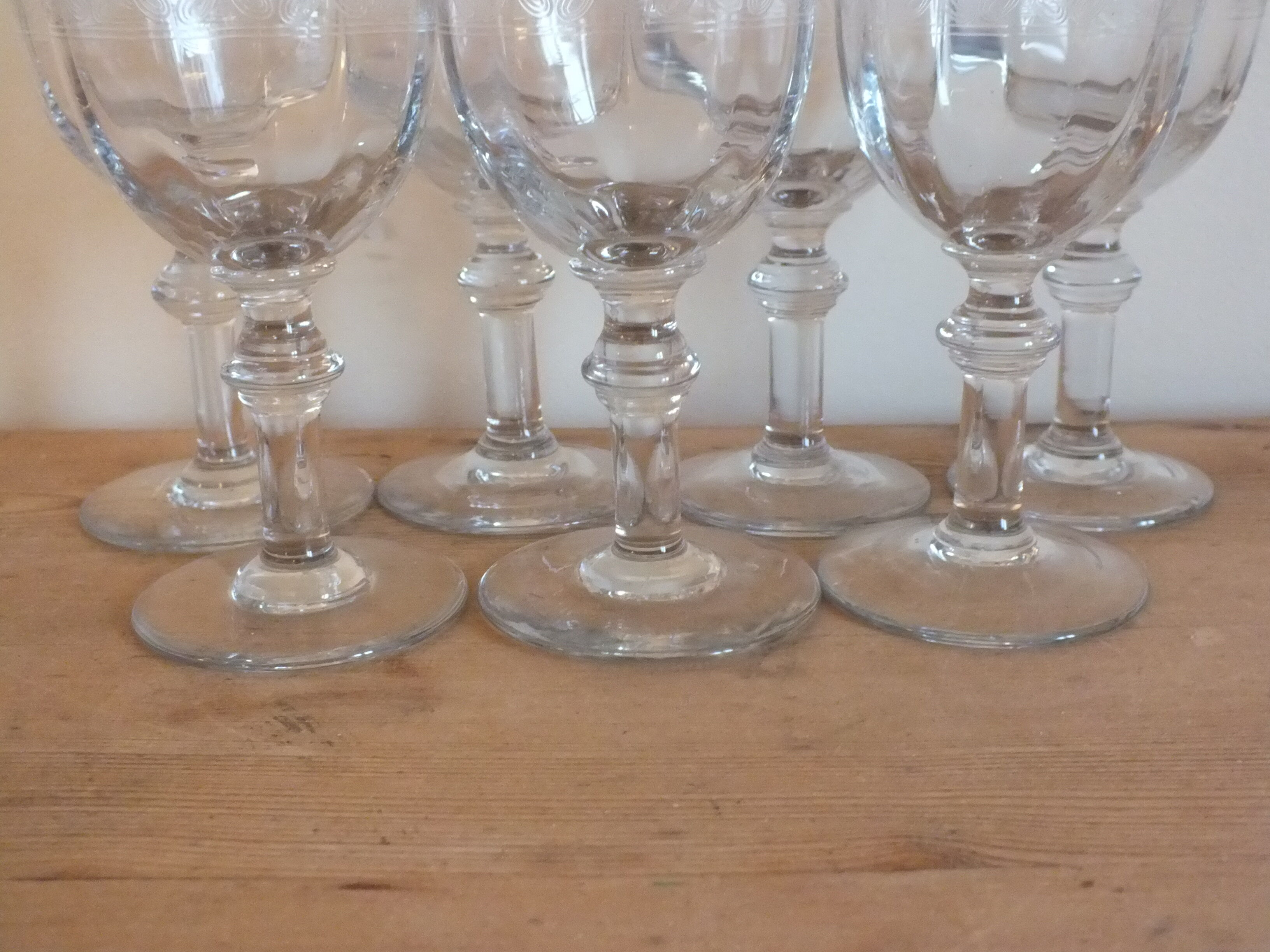 9 antique glasses in port or alcohol decorated with arabesques