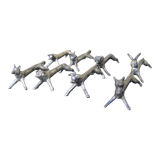 Series of eight antique knife holders in silver metal.