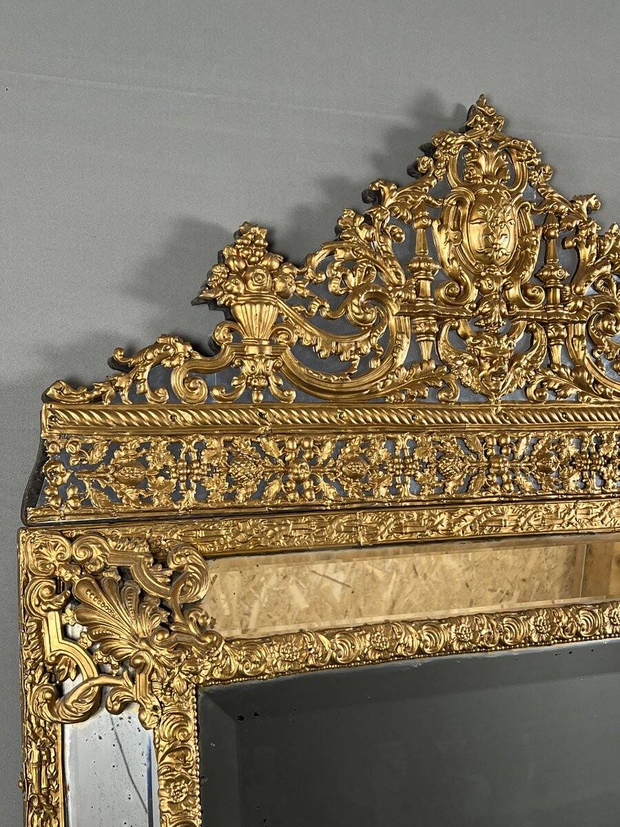 Large antique gilded metal mirror, 19th century