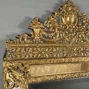 Large antique gilded metal mirror, 19th century