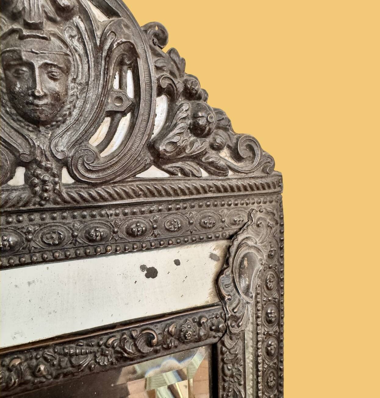 19th century wall mirror with parecloses