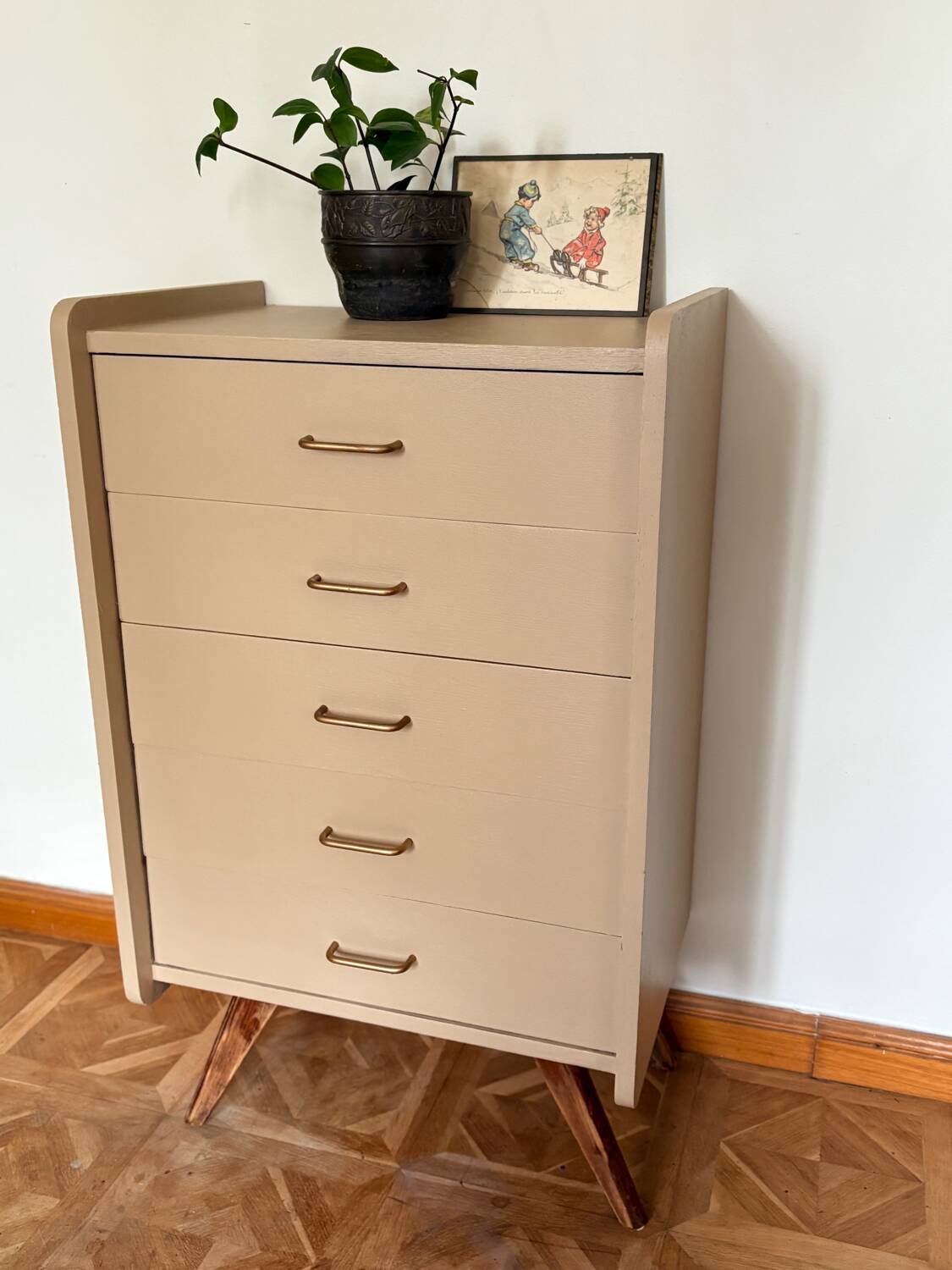 Mocha compass foot chest of drawers
