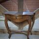 Curved console in Louis XV / Art Nouveau style made of solid wood.