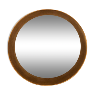 Round golden mirror with lighting