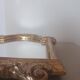 Antique mirror in gilded wood.