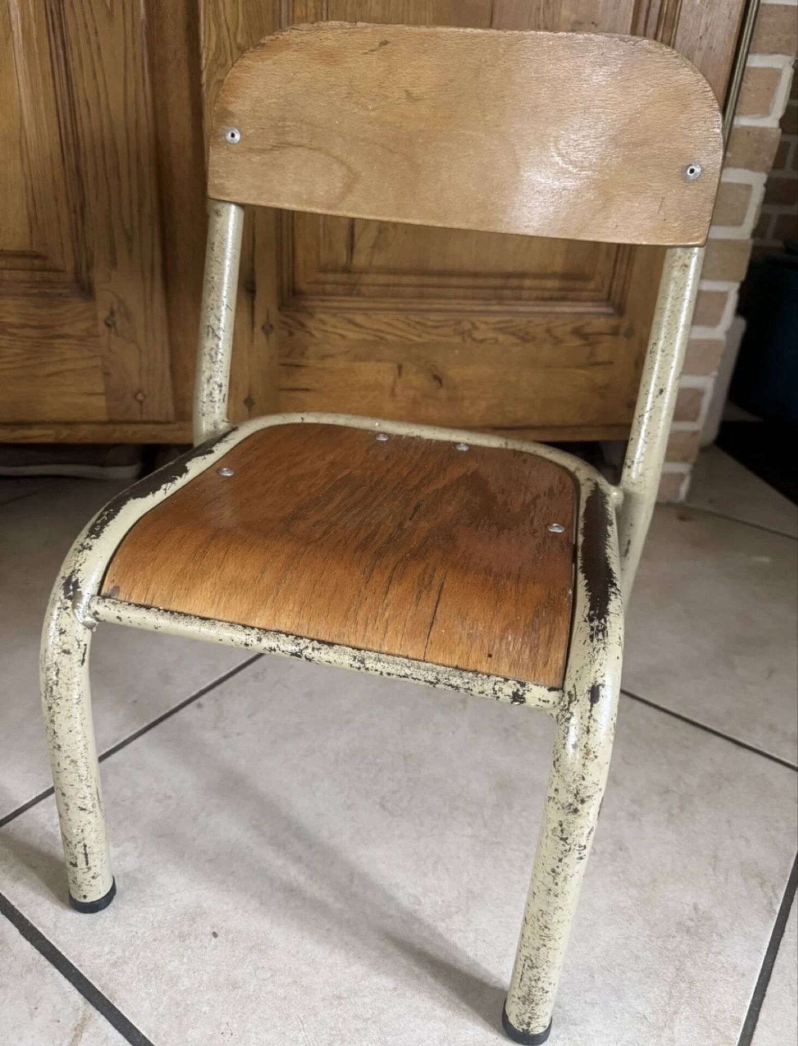 Old small school chair for children, vintage design, height a.