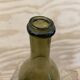 Bouteille ancienne verre verte forme libre