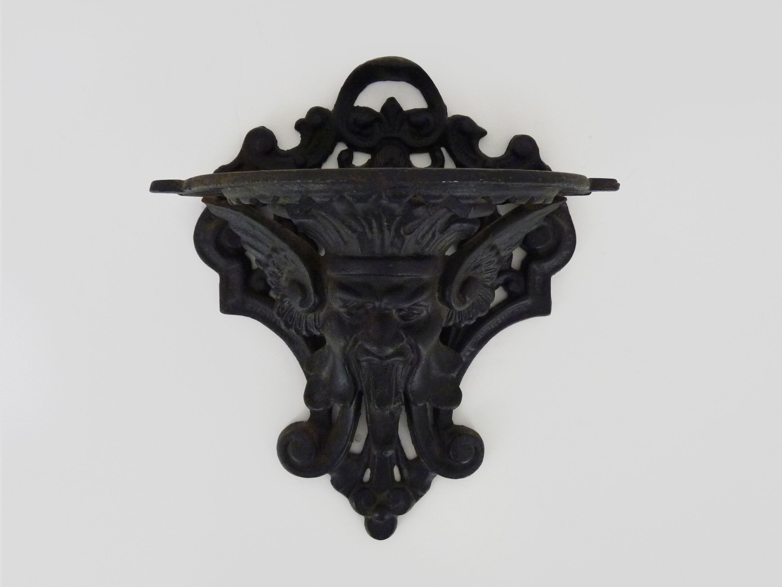 Harness, plant door, wall statue door with devil's head