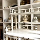 Library, white wooden sheet music cabinet.