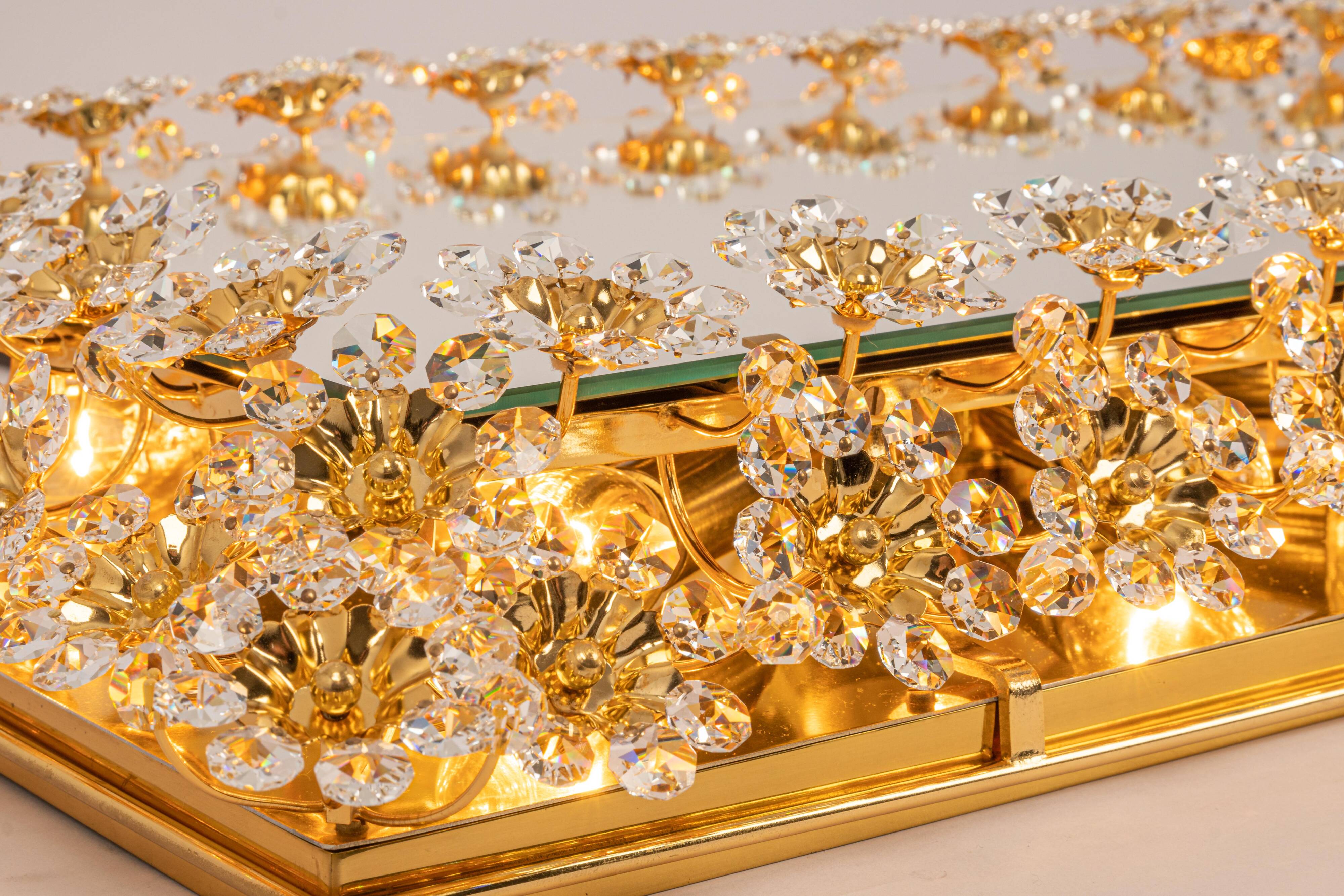 Spectacular backlit mirror in gilded brass and crystal glass by Palwa, Germany.