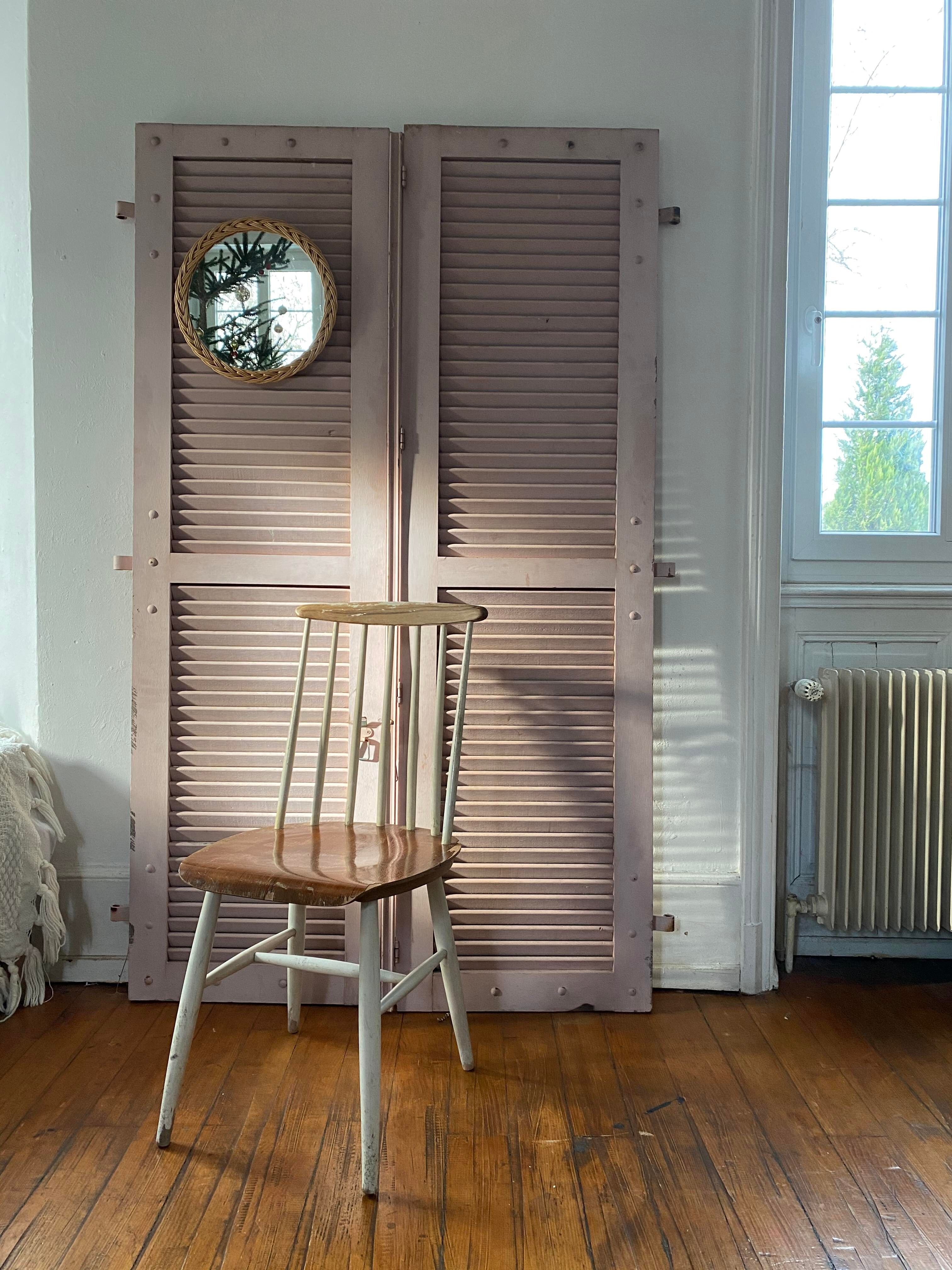 Pair of shutters with wooden shutters in old pink color