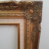 Old gilded frame in solid wood and plaster.