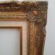 Old gilded frame in solid wood and plaster.