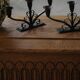 Early 20th century, pair of Danish Art Deco candlesticks in metal with three arms, 1930s.
