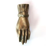 Brass hand, paper press, 50s