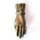 Brass hand, paper press, 50s